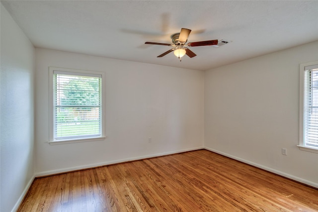 705 Kalmer St, Pasadena, TX 77502 - unfurnished room featuring wood finished floors, baseboards, and ceiling fan