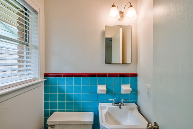 705 Kalmer St, Pasadena, TX 77502 - half bath with a sink, tile walls, and toilet