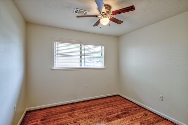 705 Kalmer St, Pasadena, TX 77502 - unfurnished room with ceiling fan, baseboards, and wood finished floors
