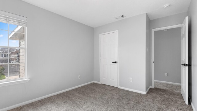 10811 Waterfern Ct, Houston, TX 77064 - unfurnished bedroom featuring carpet floors and baseboards