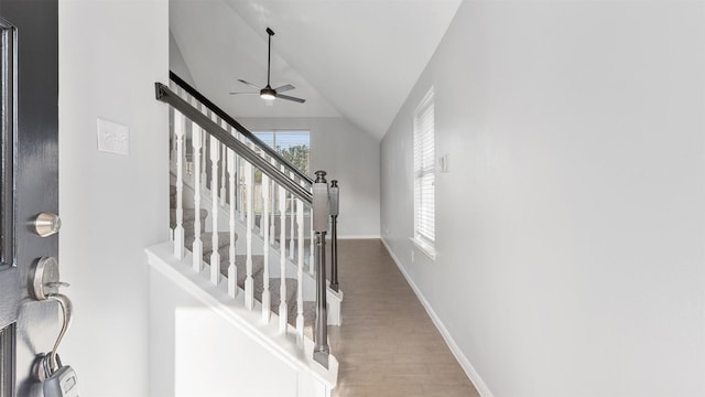 10811 Waterfern Ct, Houston, TX 77064 - stairway featuring lofted ceiling, a ceiling fan, wood finished floors, and baseboards
