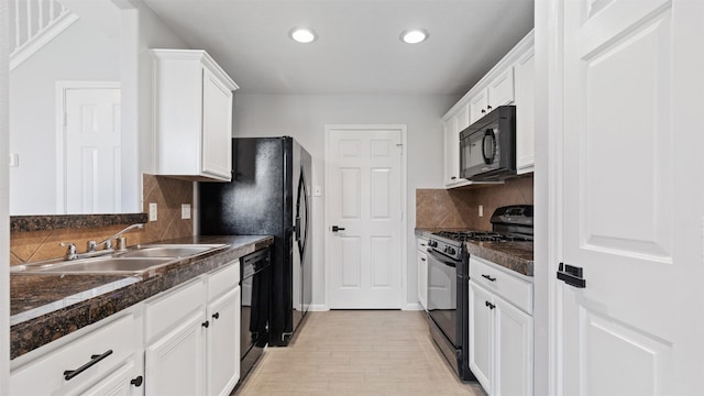 10811 Waterfern Ct, Houston, TX 77064 - kitchen featuring black appliances, a sink, recessed lighting, white cabinets, and backsplash
