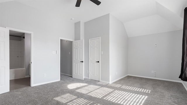 10811 Waterfern Ct, Houston, TX 77064 - unfurnished bedroom with carpet floors, baseboards, ensuite bathroom, lofted ceiling, and ceiling fan