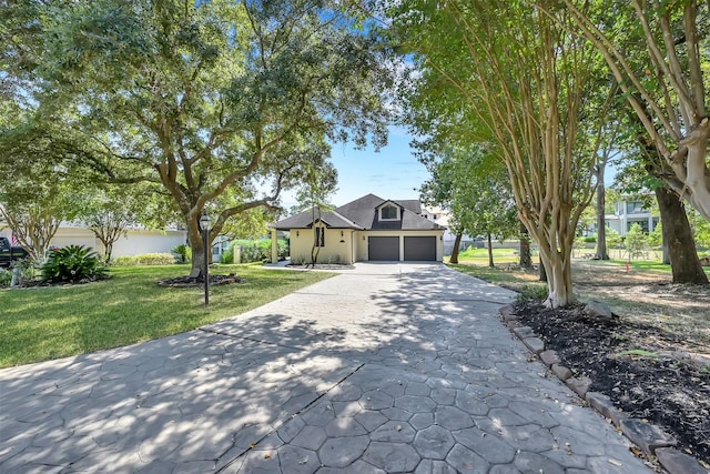 22 Creekwood Dr, Montgomery, TX 77356 - view of front of house with driveway, a front lawn, and a garage