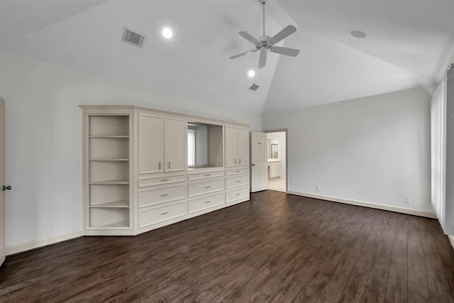 22 Creekwood Dr, Montgomery, TX 77356 - unfurnished bedroom featuring dark wood finished floors, high vaulted ceiling, baseboards, ensuite bath, and ceiling fan