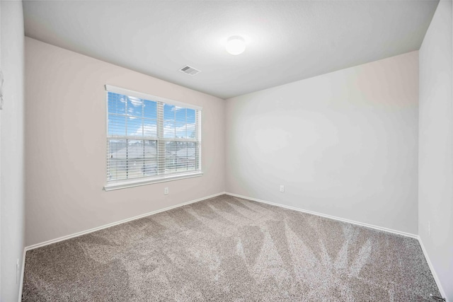 5627 Rainflower Terrace Ln, Spring, TX 77389 - carpeted spare room featuring baseboards