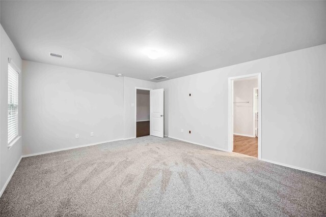 5627 Rainflower Terrace Ln, Spring, TX 77389 - carpeted spare room featuring baseboards