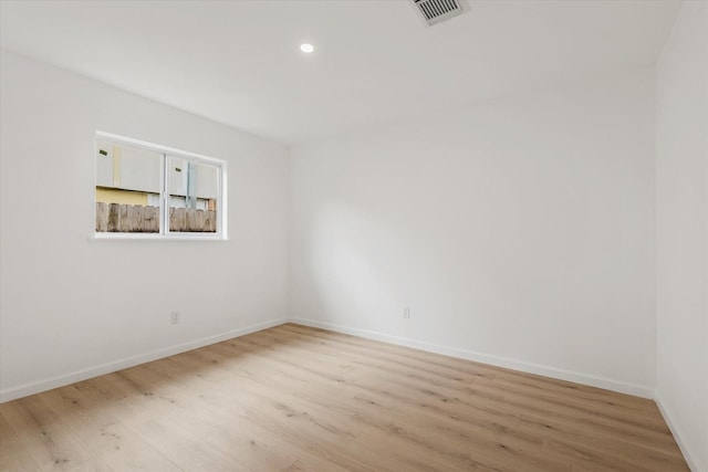 5511 Hickory Forest Dr, Houston, TX 77088 - empty room with light wood-style floors, baseboards, and recessed lighting
