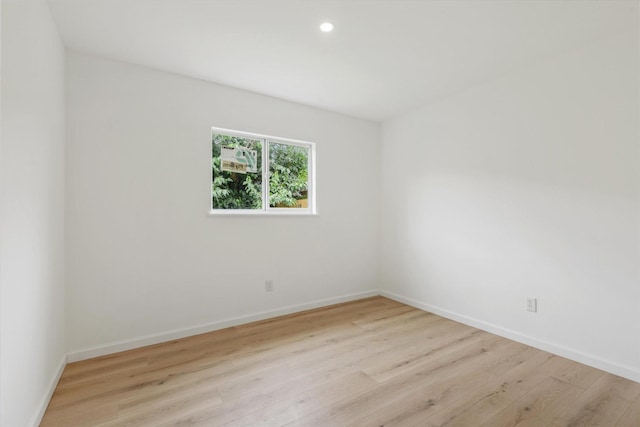 5511 Hickory Forest Dr, Houston, TX 77088 - empty room featuring wood finished floors, baseboards, and recessed lighting