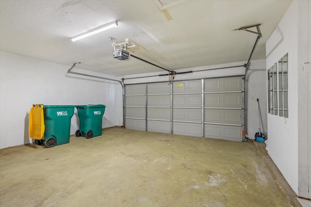 5511 Hickory Forest Dr, Houston, TX 77088 - garage featuring a garage door opener