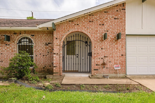 5511 Hickory Forest Dr, Houston, TX 77088 - entrance to property featuring brick siding and a garage