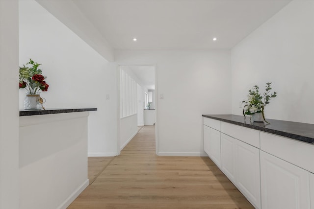 5511 Hickory Forest Dr, Houston, TX 77088 - hallway featuring light wood-style flooring, baseboards, and recessed lighting