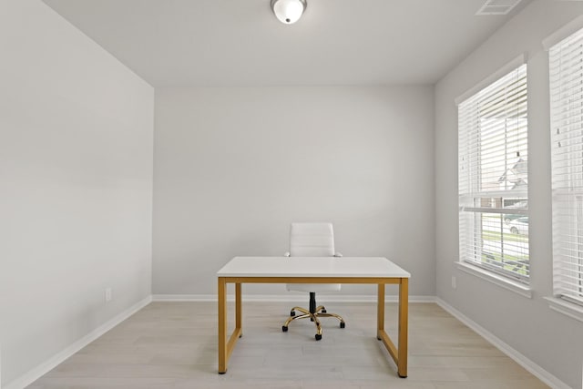 14615 Olive Sparrow Ln, Houston, TX 77049 - office space featuring light wood-style flooring and baseboards