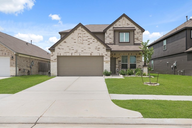 14615 Olive Sparrow Ln, Houston, TX 77049 - view of front facade with a front yard, concrete driveway, a garage, and brick siding