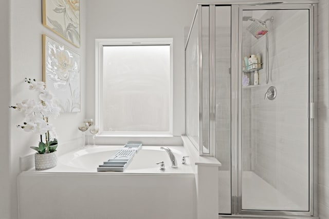 14615 Olive Sparrow Ln, Houston, TX 77049 - full bath with a stall shower and a garden tub