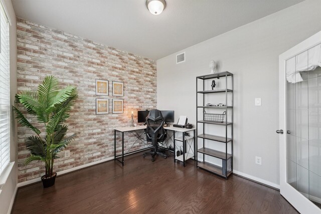 3651 Lake Bend Shore Dr, Spring, TX 77386 - home office featuring baseboards, wood finished floors, and brick wall