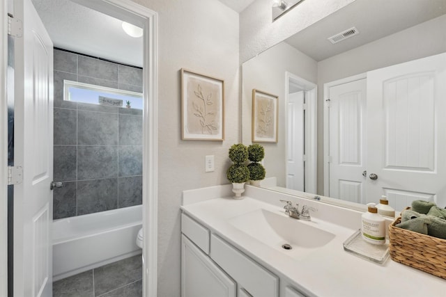 3651 Lake Bend Shore Dr, Spring, TX 77386 - bathroom featuring vanity, toilet, tile patterned floors, and shower / bathtub combination