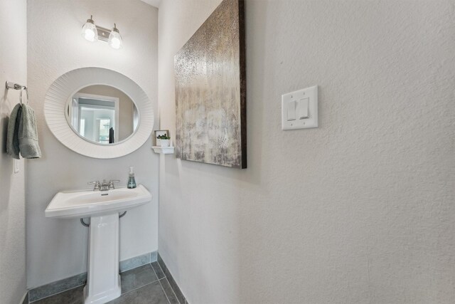 3651 Lake Bend Shore Dr, Spring, TX 77386 - bathroom featuring tile patterned floors and baseboards