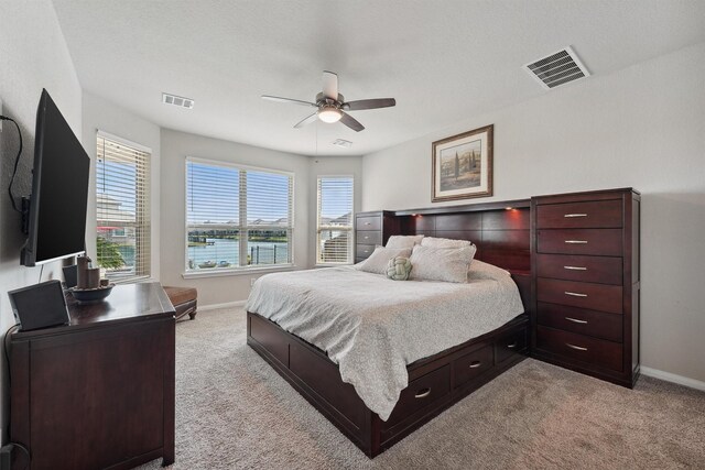 3651 Lake Bend Shore Dr, Spring, TX 77386 - bedroom featuring light colored carpet, multiple windows, and baseboards
