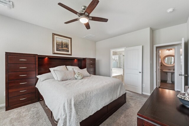 3651 Lake Bend Shore Dr, Spring, TX 77386 - bedroom with light colored carpet, connected bathroom, baseboards, and a ceiling fan