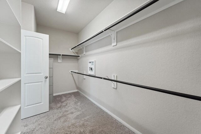 3651 Lake Bend Shore Dr, Spring, TX 77386 - walk in closet featuring light carpet