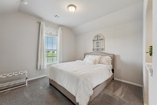 3651 Lake Bend Shore Dr, Spring, TX 77386 - bedroom with lofted ceiling, carpet flooring, and baseboards