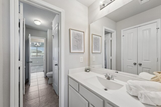 3651 Lake Bend Shore Dr, Spring, TX 77386 - bathroom featuring vanity and toilet