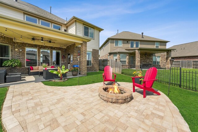 3651 Lake Bend Shore Dr, Spring, TX 77386 - view of patio featuring ceiling fan and an outdoor living space with a fire pit