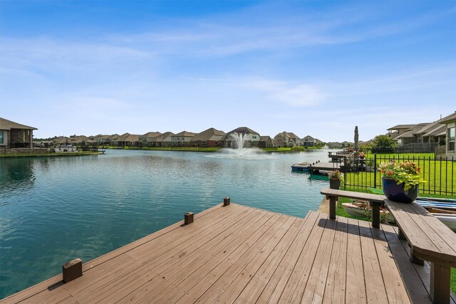 3651 Lake Bend Shore Dr, Spring, TX 77386 - dock area featuring a water view and a residential view