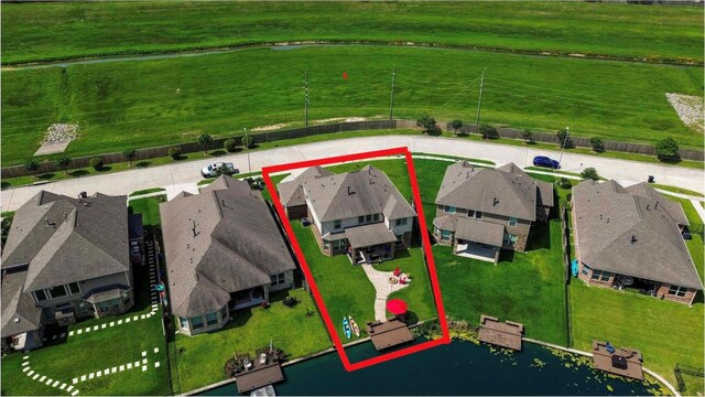 3651 Lake Bend Shore Dr, Spring, TX 77386 - aerial perspective of suburban area featuring a nearby body of water and property parcel outlined