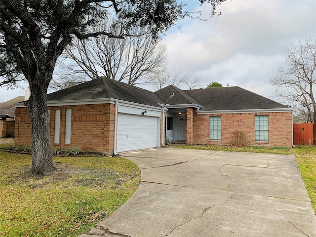 223 Kings Way, Stafford, TX 77477 - single story home with brick siding, concrete driveway, an attached garage, and roof with shingles