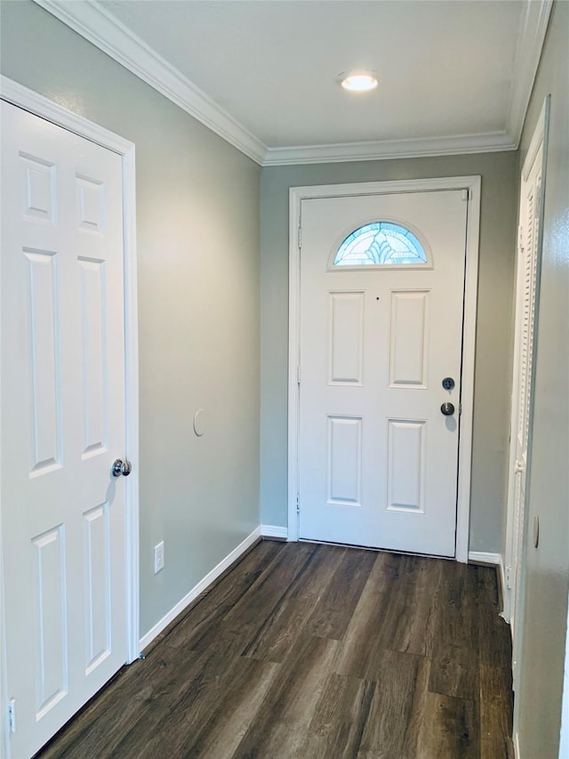 223 Kings Way, Stafford, TX 77477 - entryway featuring dark wood-style flooring, ornamental molding, and baseboards
