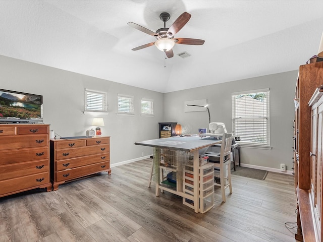19122 High Canyon Ln, Tomball, TX 77377 - home office with lofted ceiling, ceiling fan, light wood finished floors, and baseboards