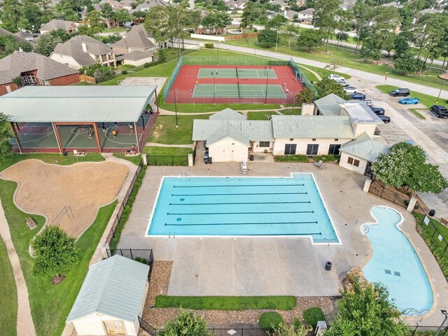 19122 High Canyon Ln, Tomball, TX 77377 - aerial perspective of suburban area featuring a pool area