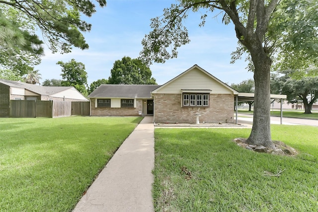 402 E Lambuth Ln, Deer Park, TX 77536 - ranch-style home with brick siding and a carport