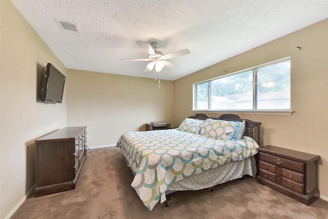 402 E Lambuth Ln, Deer Park, TX 77536 - carpeted bedroom with baseboards and a ceiling fan