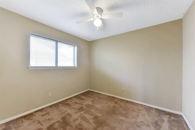 402 E Lambuth Ln, Deer Park, TX 77536 - empty room with carpet floors, a ceiling fan, and baseboards