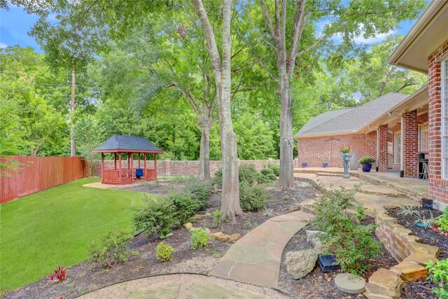 13502 Winter Creek Ct, Houston, TX 77077 - view of yard with a gazebo and a patio