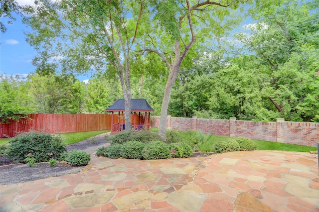 13502 Winter Creek Ct, Houston, TX 77077 - fenced backyard with a patio