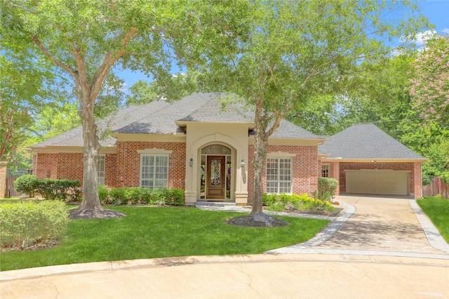 13502 Winter Creek Ct, Houston, TX 77077 - view of front of house with a garage, a front lawn, driveway, and brick siding