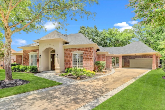 13502 Winter Creek Ct, Houston, TX 77077 - view of front of house with an attached garage, brick siding, a front lawn, and concrete driveway