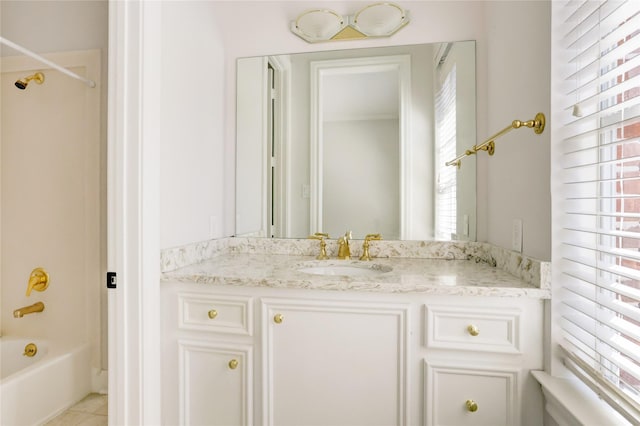 13502 Winter Creek Ct, Houston, TX 77077 - bathroom with vanity, plenty of natural light, shower / bath combination, and tile patterned floors