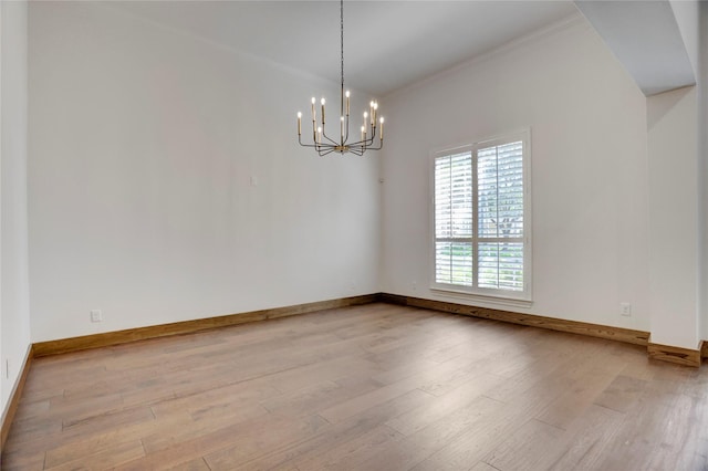13502 Winter Creek Ct, Houston, TX 77077 - unfurnished room featuring a chandelier, wood finished floors, baseboards, and crown molding