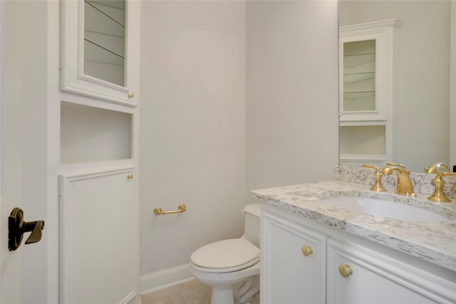 13502 Winter Creek Ct, Houston, TX 77077 - half bath with vanity, toilet, tile patterned flooring, and baseboards