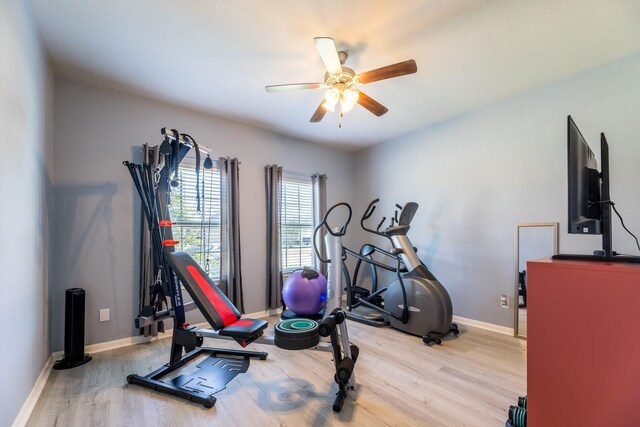 8806 Explorer Dr, Texas City, TX 77591 - workout room featuring wood finished floors, a ceiling fan, and baseboards