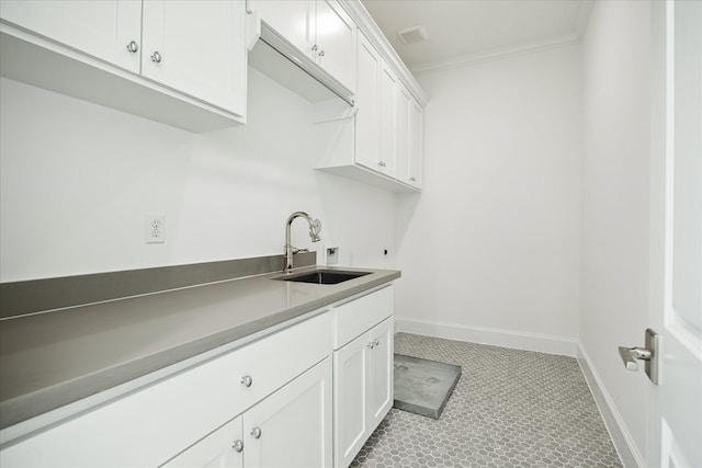 1139 Castellina Ln, Houston, TX 77055 - washroom with cabinet space, ornamental molding, and washer hookup