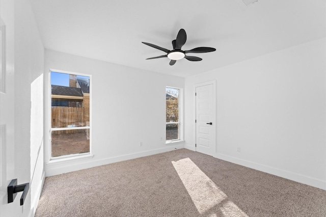 5507 Council Grove Ln, Houston, TX 77088 - spare room with carpet floors, ceiling fan, and baseboards