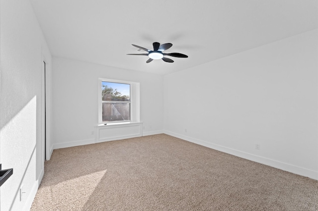 5507 Council Grove Ln, Houston, TX 77088 - unfurnished room with light carpet, baseboards, and a ceiling fan