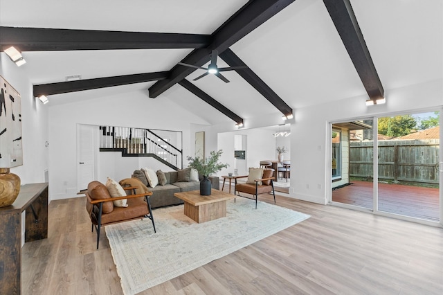 5507 Council Grove Ln, Houston, TX 77088 - living area with stairs, light wood finished floors, baseboards, and ceiling fan