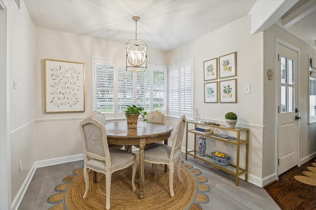 7810 Pagewood Ln, Houston, TX 77063 - dining space with a chandelier and baseboards